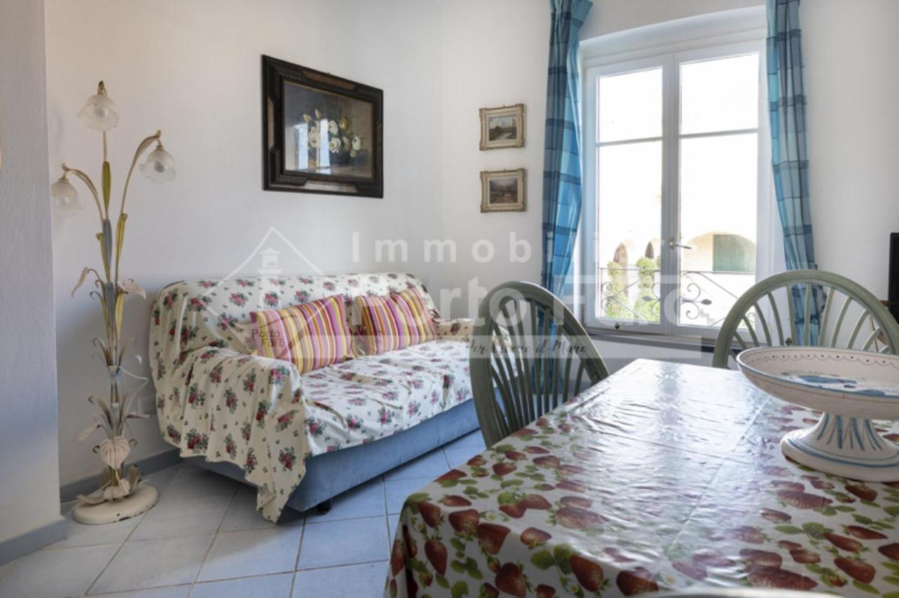 Villa 12 Centro - Trilocale Vista Mare Sul Faro Di Porto Faro Palau Exterior foto