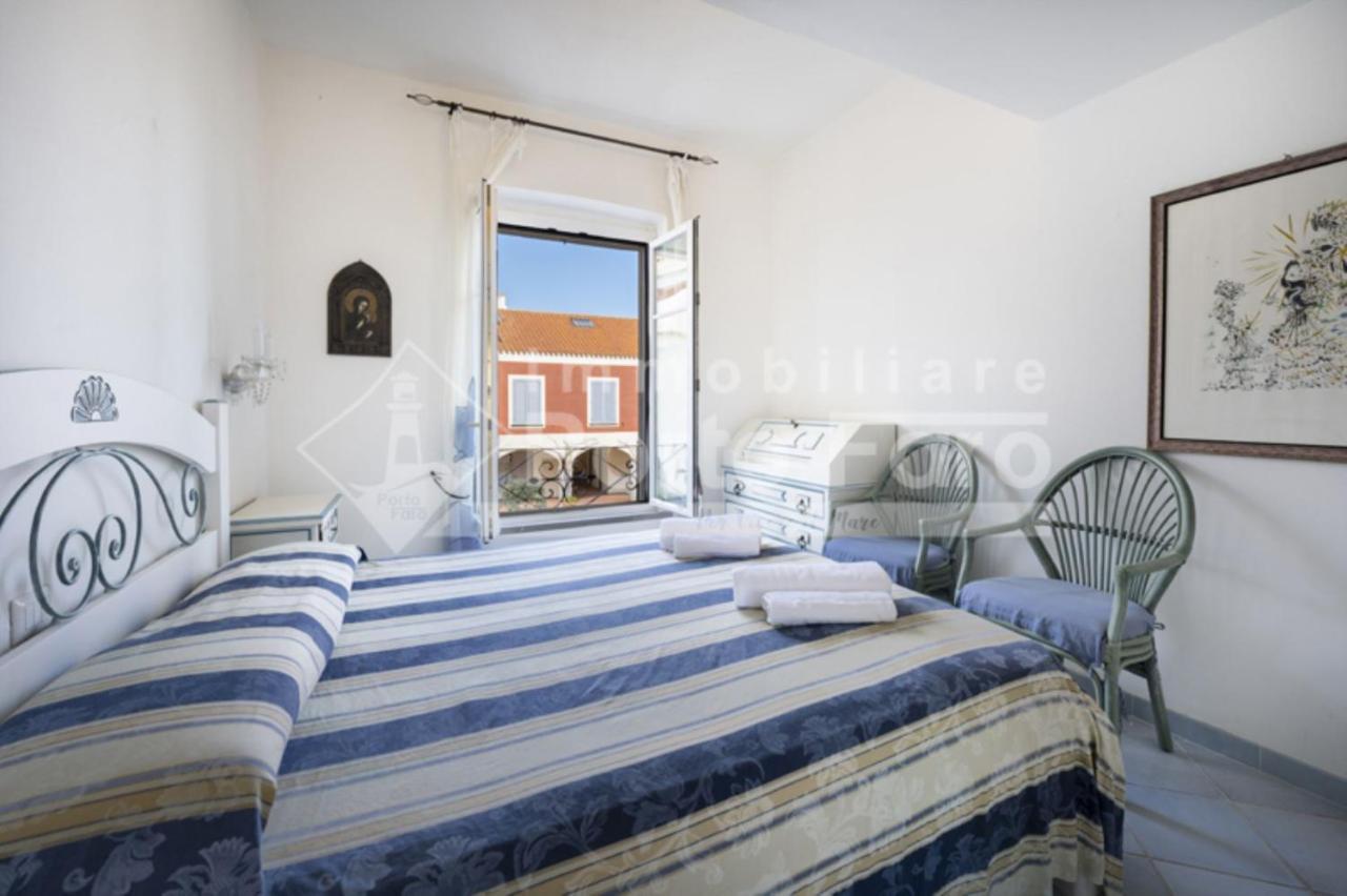 Villa 12 Centro - Trilocale Vista Mare Sul Faro Di Porto Faro Palau Exterior foto